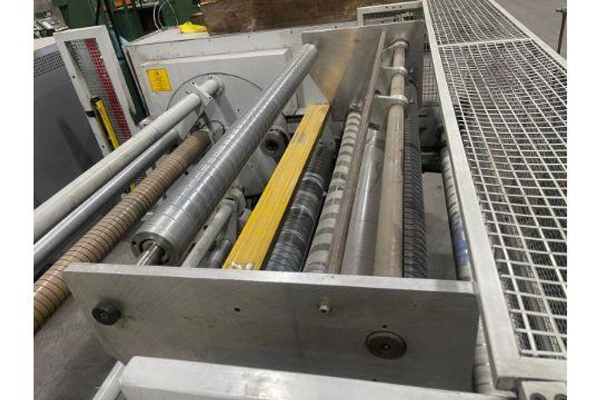 Used 58" WIDE COMEXI TURRET REWIND WITH SPLICING 32" DIAMETER
