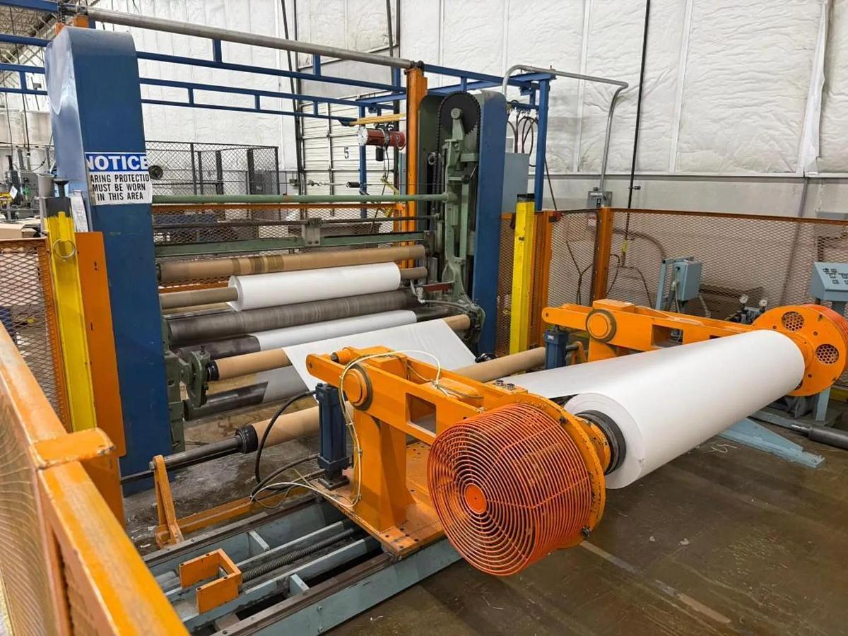 Used 84" WIDE SHANKS TWO DRUM SLITTER REWINDER WITH SHAFTLESS FLOOR PICK UP UNWIND STAND