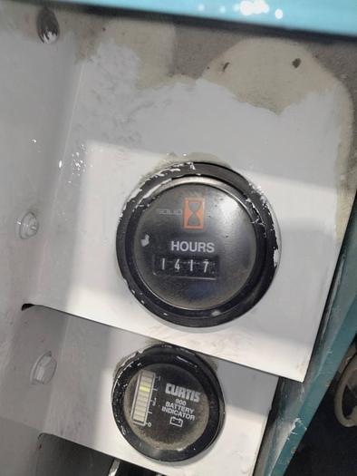 Used TENNANT FLOOR CLEANER SWEEPER MODEL 235E