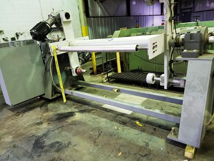 Used 64" WIDE RELIANT NON STOP TURRET REWIND WITH SPLICER 40" DIAMETER