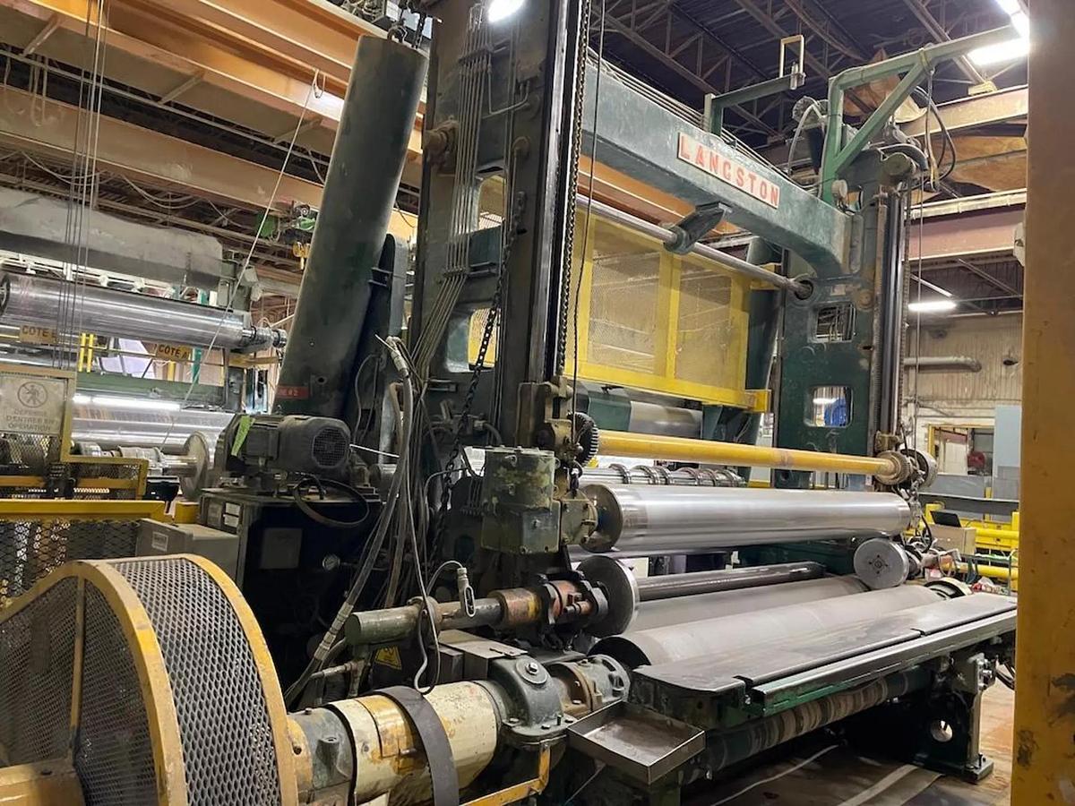 Used 110" FACE LANGSTON MODEL DA TWO DRUM SLITTER REWINDER WITH UPGRADED MARIO COTTA SLITTING SECTION