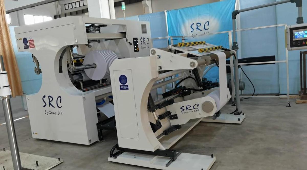 Used 31" WIDE SRC SYSTEMS LTD. 1060CS CANTILEVERED CENTER SURFACE DUPLEX SLITTER - 2025