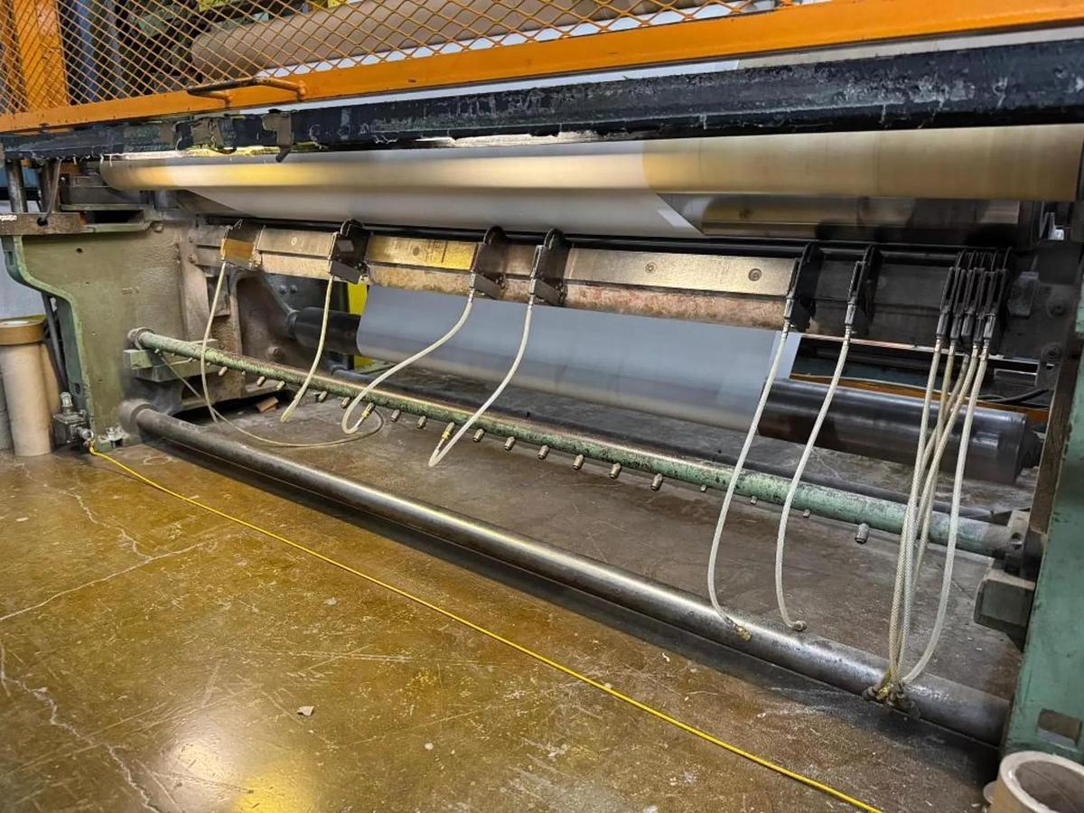 Used 84" WIDE SHANKS TWO DRUM SLITTER REWINDER WITH SHAFTLESS FLOOR PICK UP UNWIND STAND