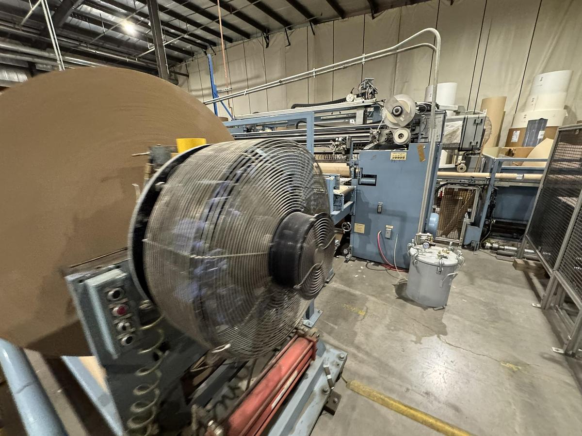 Used 72" WIDE JENNERJAHN MODEL SRA-72 COUNTER ROLL SLITTER REWINDER