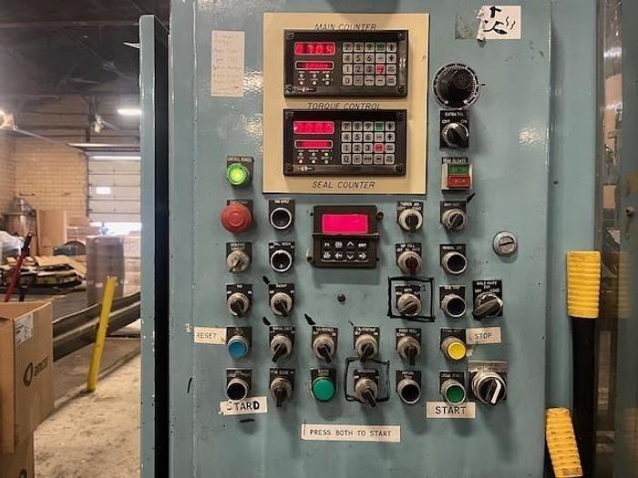 Used 54" JENNERJAHN COUNTER ROLL REWINDER WITH SLITTING REBUILT 2006