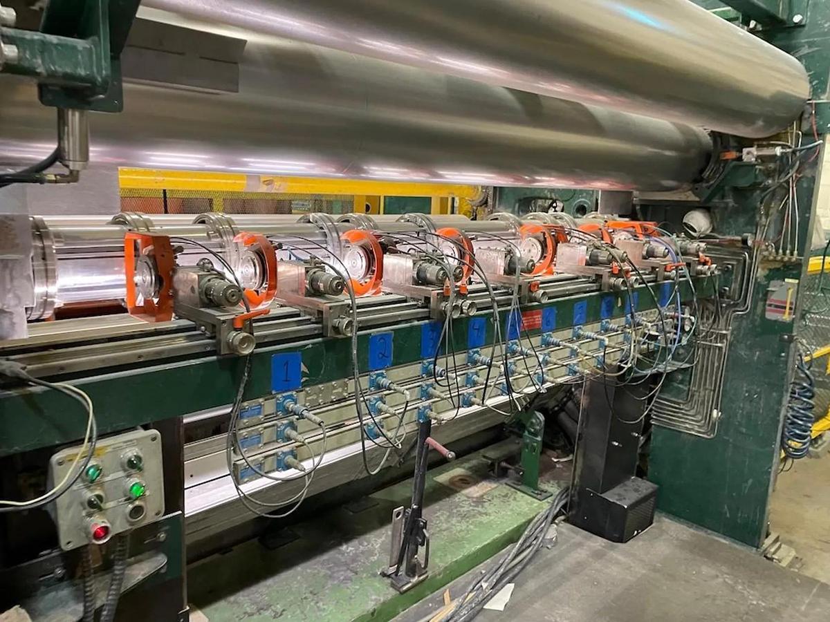 Used 110" FACE LANGSTON MODEL DA TWO DRUM SLITTER REWINDER WITH UPGRADED MARIO COTTA SLITTING SECTION