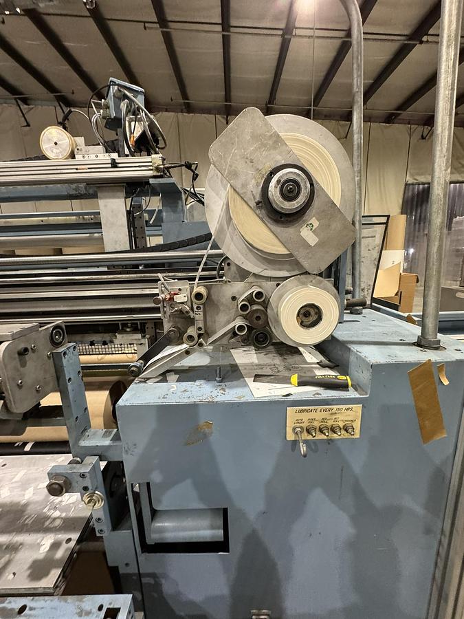 Used 72" WIDE JENNERJAHN MODEL SRA-72 COUNTER ROLL SLITTER REWINDER