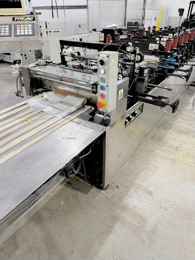 Used TOTANI MACHINE MODEL BH-60DLC 3 SIDE SEAL POUCH MACHINE - REFURBISHED AND RUNNING