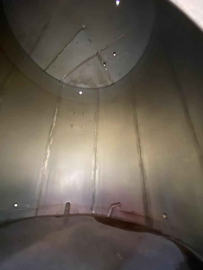 Used 10,557 GALLON STAINLESS STEEL VERTICAL TANK