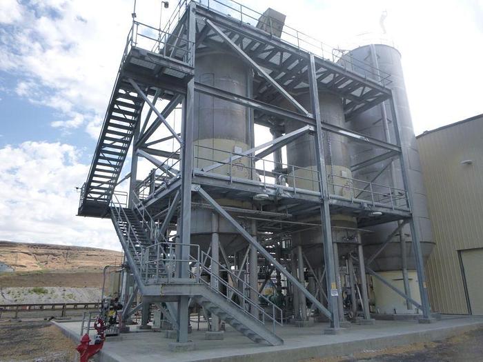 Used T BAILEY 316L STAINLESS STEEL TANK 33' TALL 12' DIAMETER MANUFACTURED 2018 WITH AGITATOR