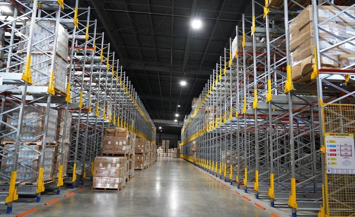 Used SSI SCHAFER AUTOMATIC FIFO PALLET RACKING STORAGE SYSTEM WITH 3 ORBITERS - MFG 2021