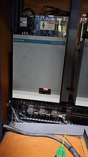 Used 63" WIDE KAMPF CONSLIT US 106 DUPLEX CANTILEVERED SLITTER REWINDER