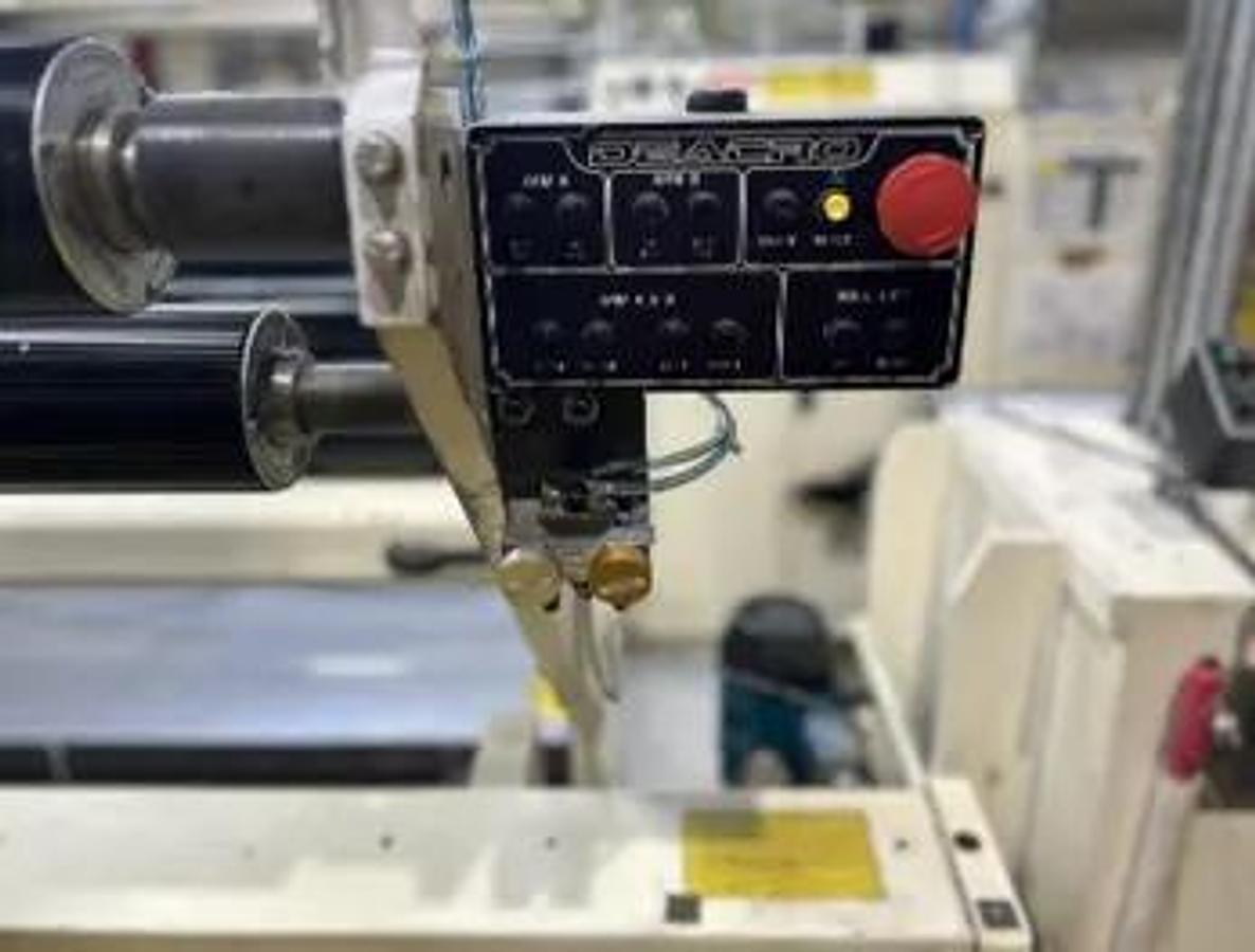Used 110" WIDE DEACRO DA653D / 162C SIMPLEX REWINDER