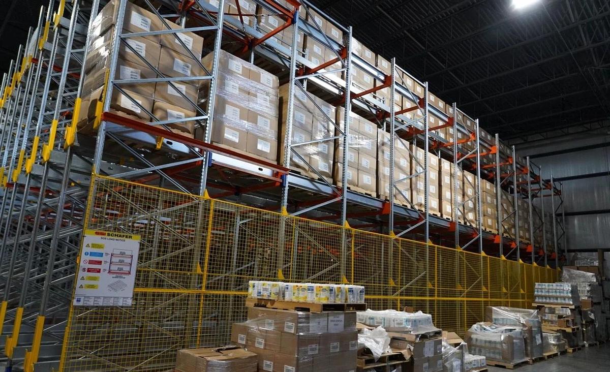 Used SSI SCHAFER AUTOMATIC FIFO PALLET RACKING STORAGE SYSTEM WITH 3 ORBITERS - MFG 2021