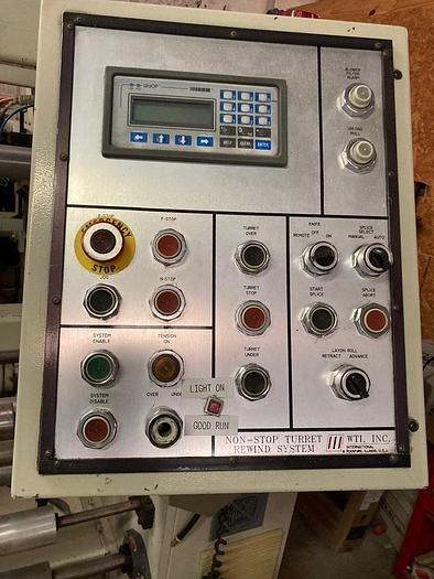Used 26" WTI NON STOP REWIND 50" DIAMETER