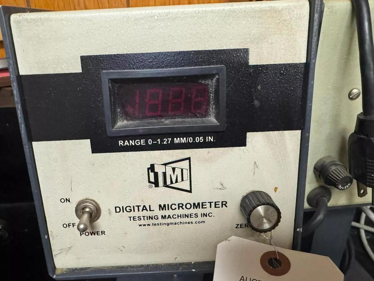 Used (2) TMI DIGITAL MICROMETER TESTING MACHINES MODEL 49-70