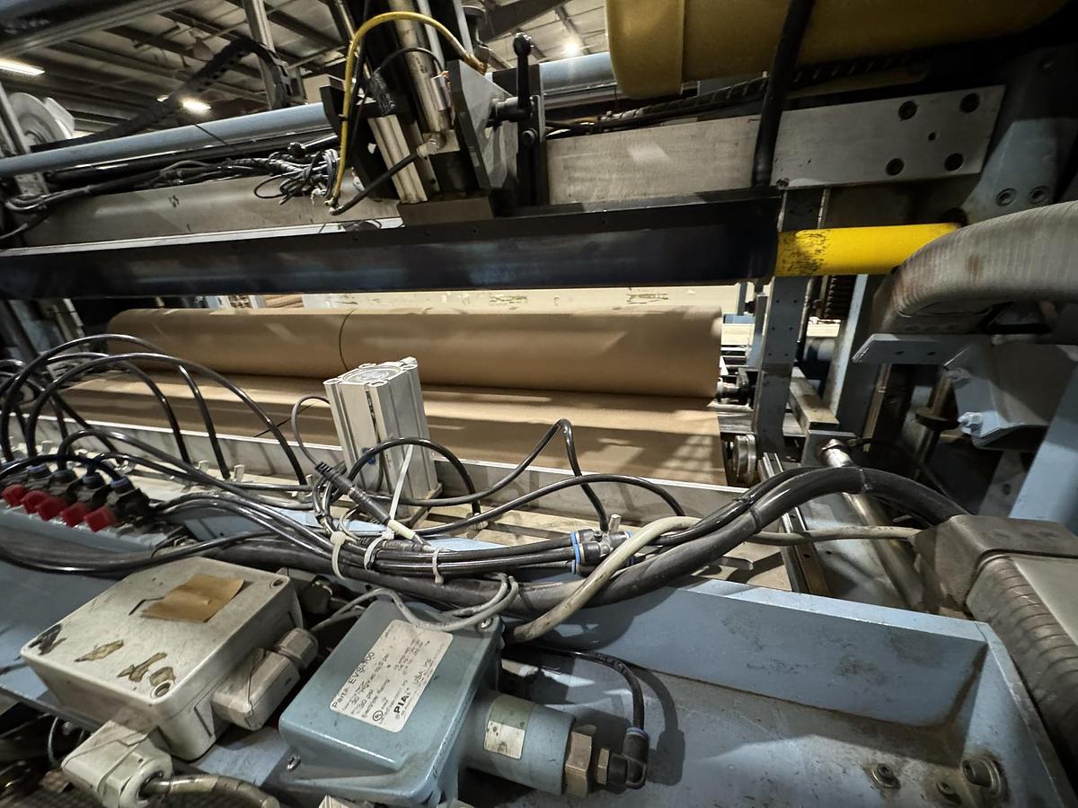 Used 72" WIDE JENNERJAHN MODEL SRA-72 COUNTER ROLL SLITTER REWINDER