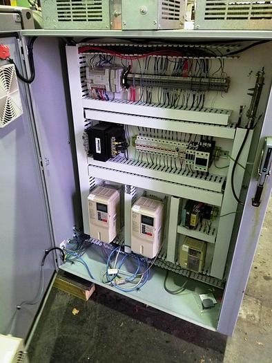 Used 64" WIDE RELIANT NON STOP TURRET REWIND WITH SPLICER 40" DIAMETER