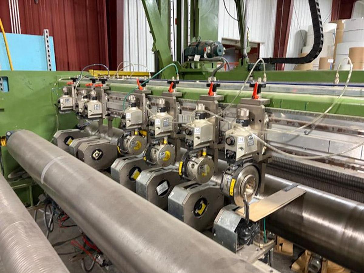 Used 134” WIDE TOSCHI (TOSOTEC) MODEL 4000-3S TWO DRUM SLITTER REWINDER - 71" REWIND DIAMETER - NEW PLC & DRIVES 2023