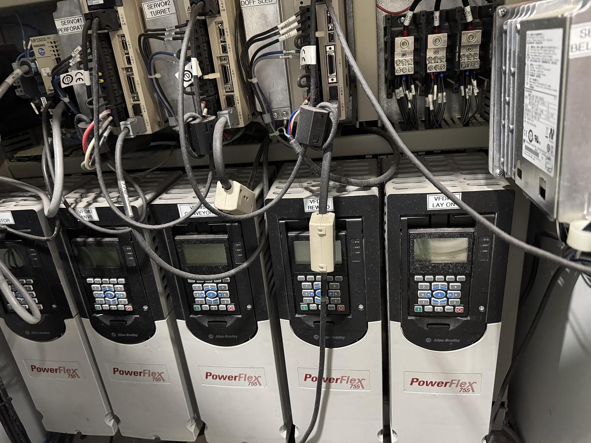 Used 50" WIDE PINNACLE VERSA SPR WIPE LINE SLITTER REWINDER / PERFORATOR