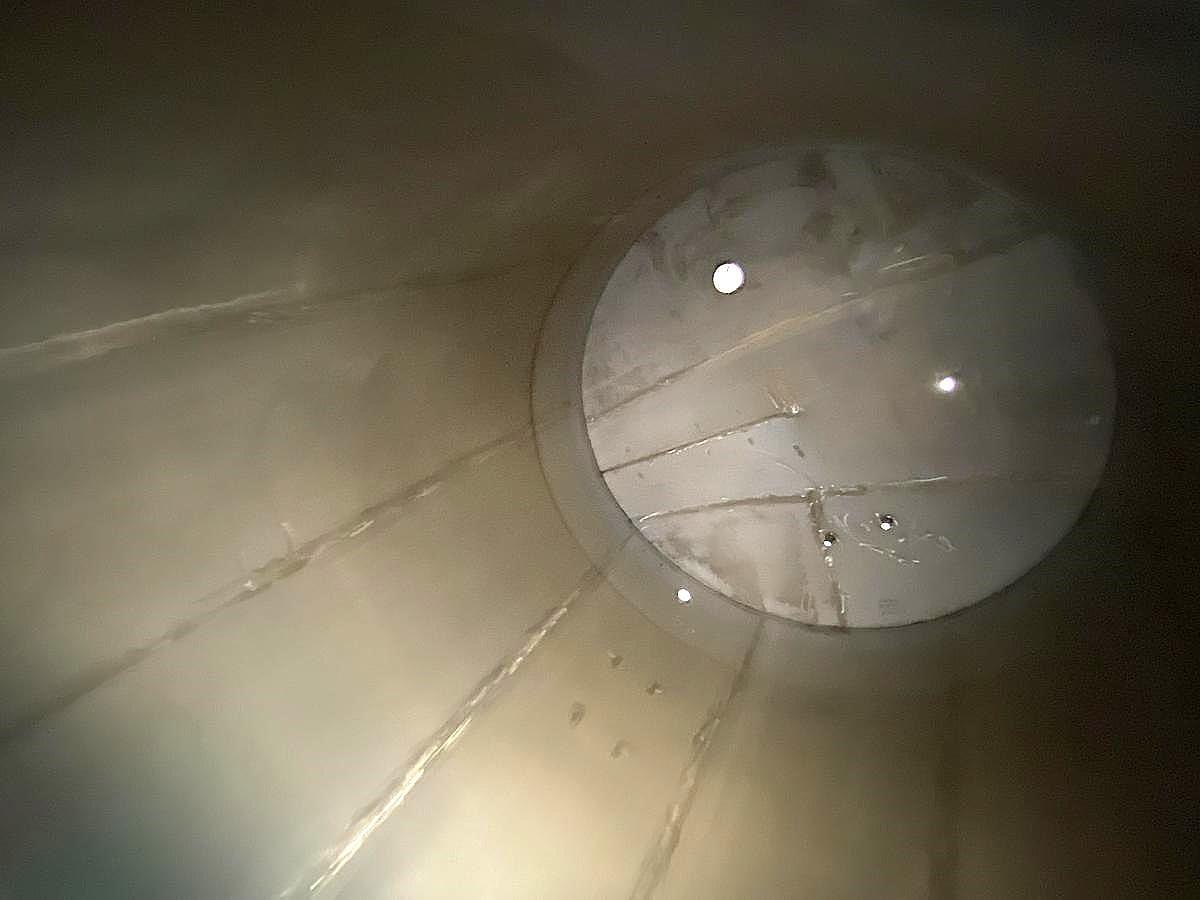 Used 10,557 GALLON STAINLESS STEEL VERTICAL TANK