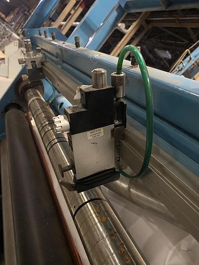 Used 72" WIDE CEI/GERBCO COUNTER ROLL SLITTER REWINDER - PENDING