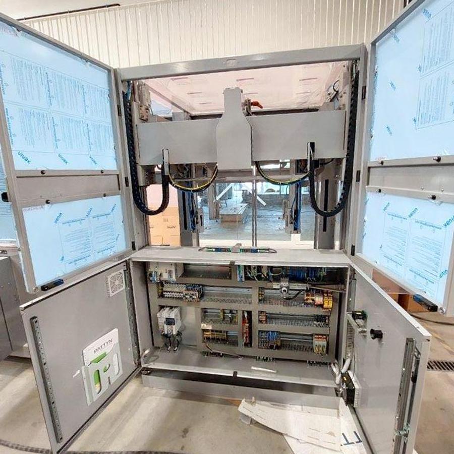 Used PATTYN HIGH-SPEED CASE ERECTING AND BAG INSERTING AUTOMATED PACKAGING SYSTEM