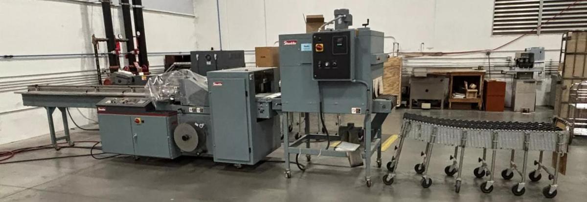 Used SHANKLIN  MDL. F-5A AUTOMATIC SIDE SEAL SHRINK WRAPPER SYSTEM
