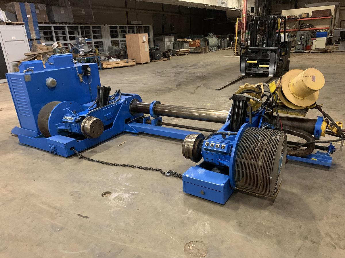 Used 65" JAGENBERG MODEL SE-18 SHAFTLESS FLOOR PICK UP UNWIND STAND 72" ROLL DIAMETER CAPACITY