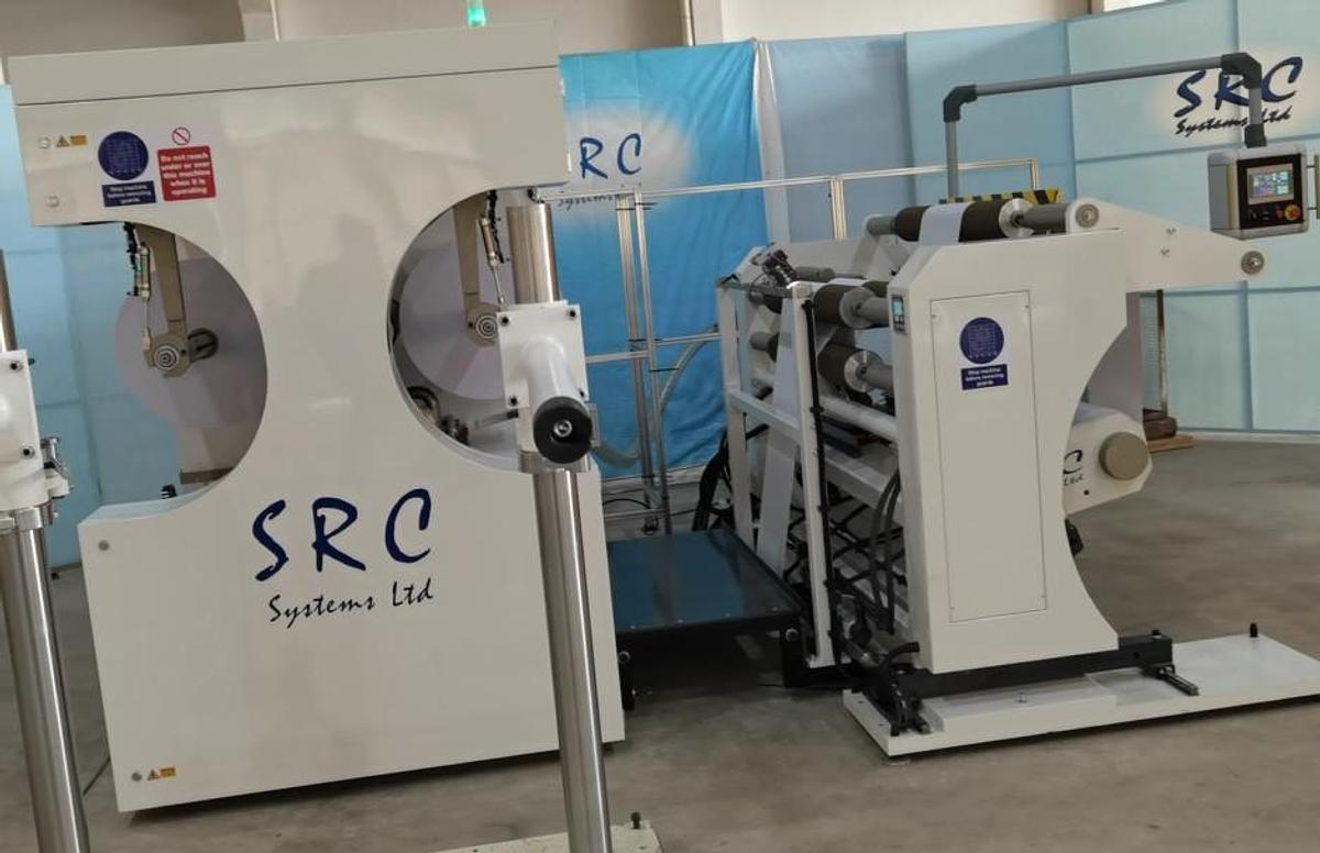 Used 31" WIDE SRC SYSTEMS LTD. 1060CS CANTILEVERED CENTER SURFACE DUPLEX SLITTER - 2025