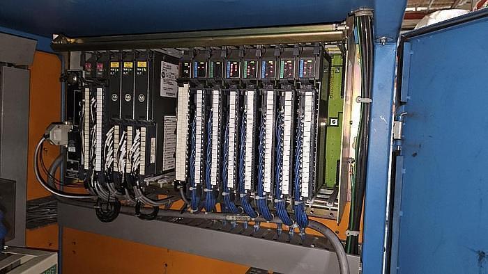 Used 63" WIDE KAMPF CONSLIT US 106 DUPLEX CANTILEVERED SLITTER REWINDER