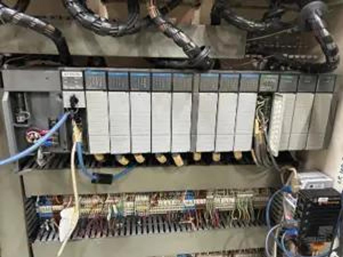 Used 110" WIDE DEACRO DA653D / 162C SIMPLEX REWINDER