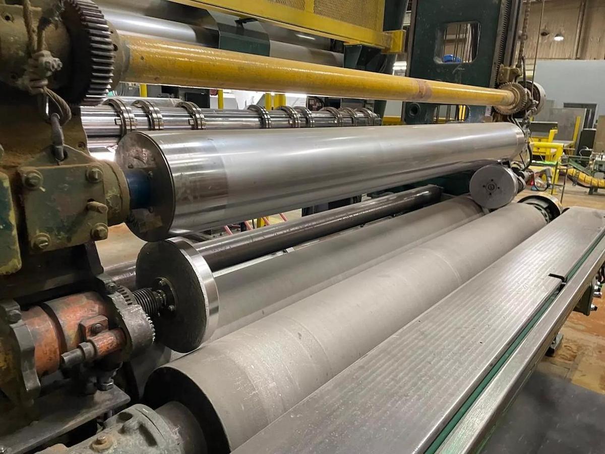 Used 110" FACE LANGSTON MODEL DA TWO DRUM SLITTER REWINDER WITH UPGRADED MARIO COTTA SLITTING SECTION