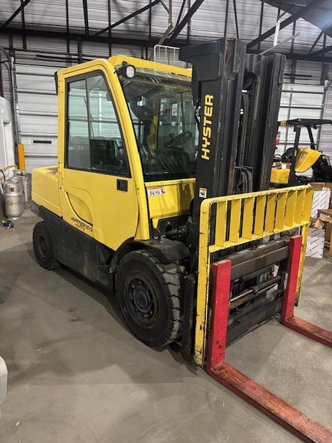 Used 10,000LB CAPACITY HYSTER H100FT FULL CAB 4-WAY HYDRAULICS WITH FORK POSITIONER