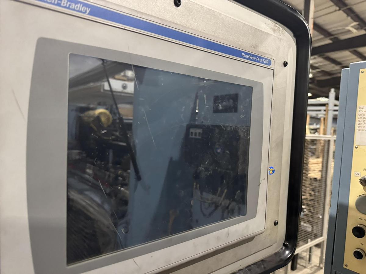 Used 72" WIDE JENNERJAHN MODEL SRA-72 COUNTER ROLL SLITTER REWINDER