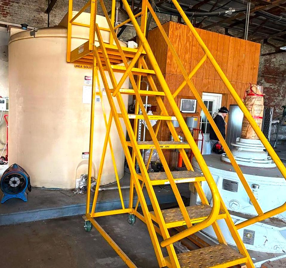 Used 2,500 GALLON PLASTIC TANK WITH STEEL STAIRWAY STAIRWAAY