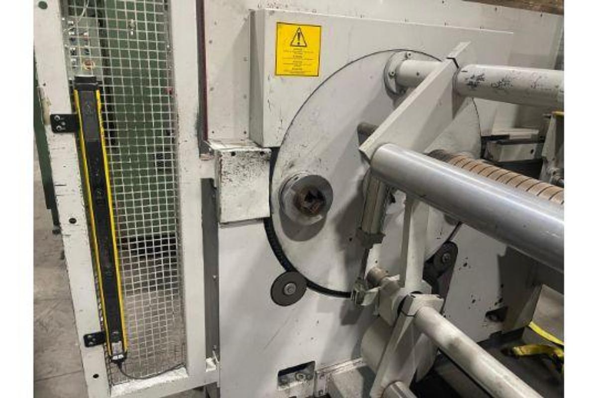 Used 58" WIDE COMEXI TURRET REWIND WITH SPLICING 32" DIAMETER