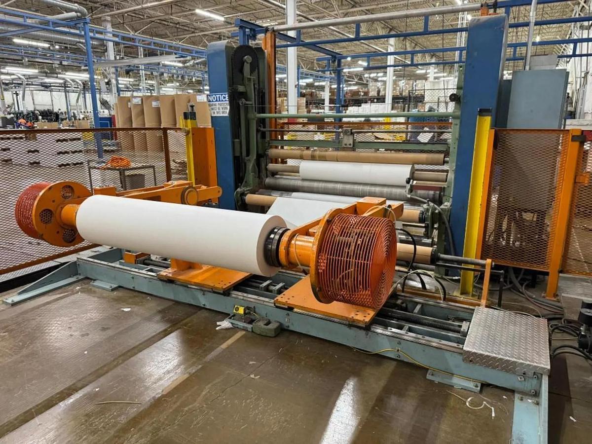Used 84" WIDE SHANKS TWO DRUM SLITTER REWINDER WITH SHAFTLESS FLOOR PICK UP UNWIND STAND 