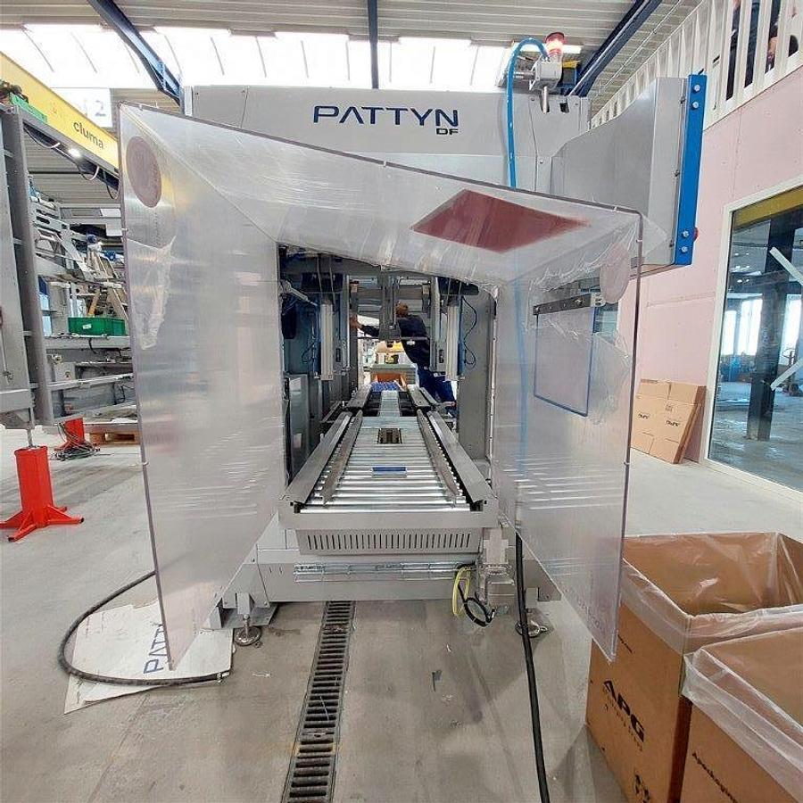 Used PATTYN HIGH-SPEED CASE ERECTING AND BAG INSERTING AUTOMATED PACKAGING SYSTEM