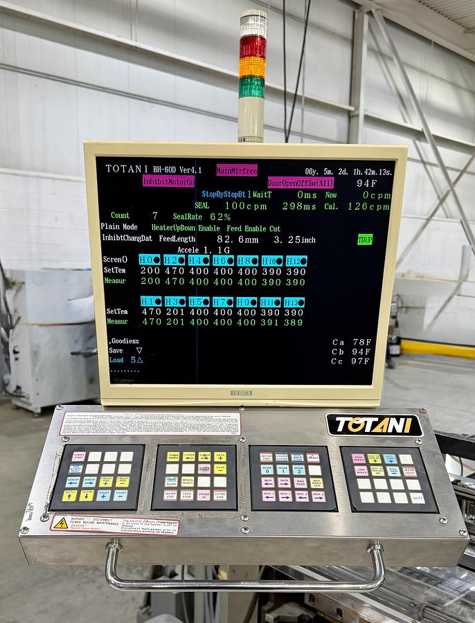 Used TOTANI MACHINE MODEL BH-60DLC 3 SIDE SEAL POUCH MACHINE - REFURBISHED AND RUNNING