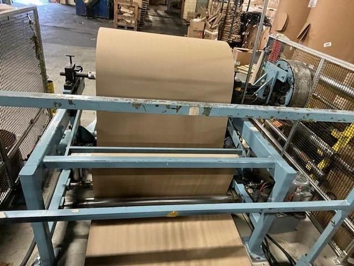 Used 54" JENNERJAHN COUNTER ROLL REWINDER WITH SLITTING REBUILT 2006