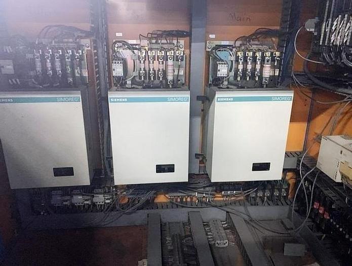 Used 63" WIDE KAMPF CONSLIT US 106 CANTILEVERED DUPLEX SLITTER: 24" REWINDS TIDLAND SHEAR SLITTING