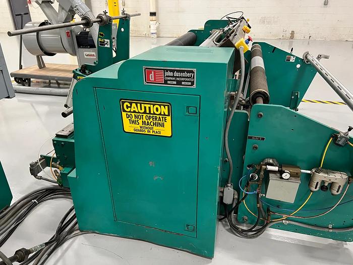 Used 65" DUSENBERY 820 TK CENTER SURFACE REWINDER - PENDING LS