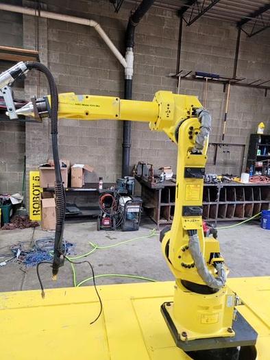 Used FANUC Arcmate 100ibe Industrial Welding Robot with RJ3IC Controller with Lincoln Powerwave 455M Welder and Air Powered Positioner - Very Low Hours