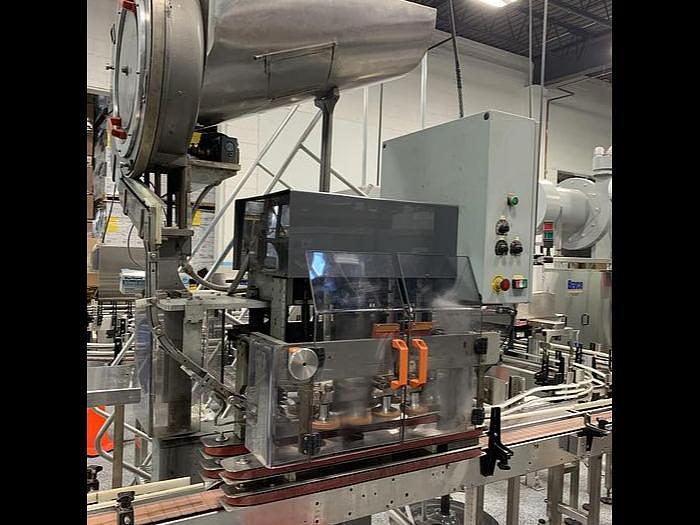 Used Colton 8 head filling line for 16oz round bottles - 90-110/min