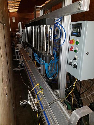 Used EQUIPMENT EXPRESS BOTTLING LINE (FILLER AND CAPPER)