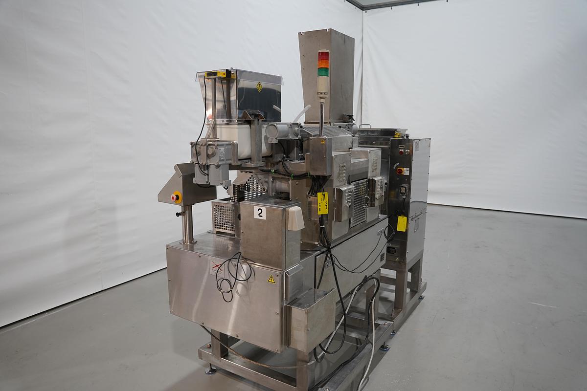 Gebruikt 2006 Rheon vormmachine met bebloeming