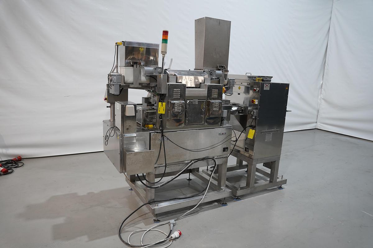 Gebruikt 2006 Rheon vormmachine met bebloeming