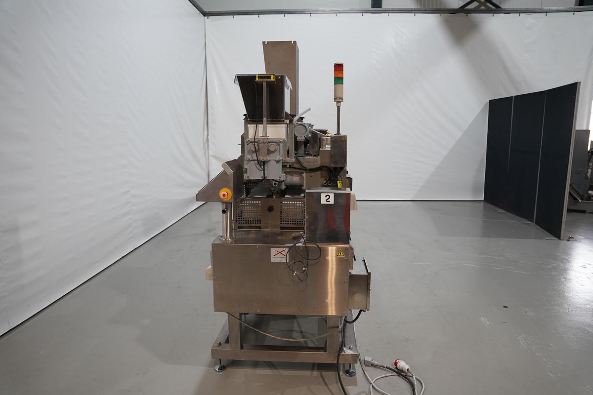 Gebruikt 2006 Rheon vormmachine met bebloeming