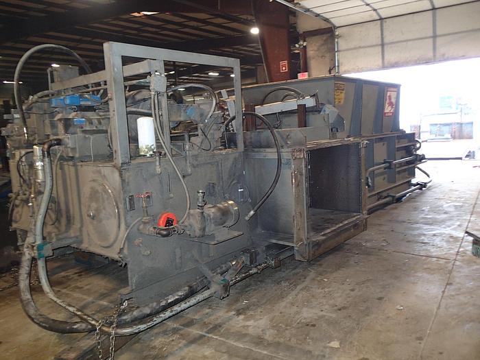 Used LOGEMANN TWO RAM BALER MODEL 245AT1; 50 HP; 9" CYLINDER